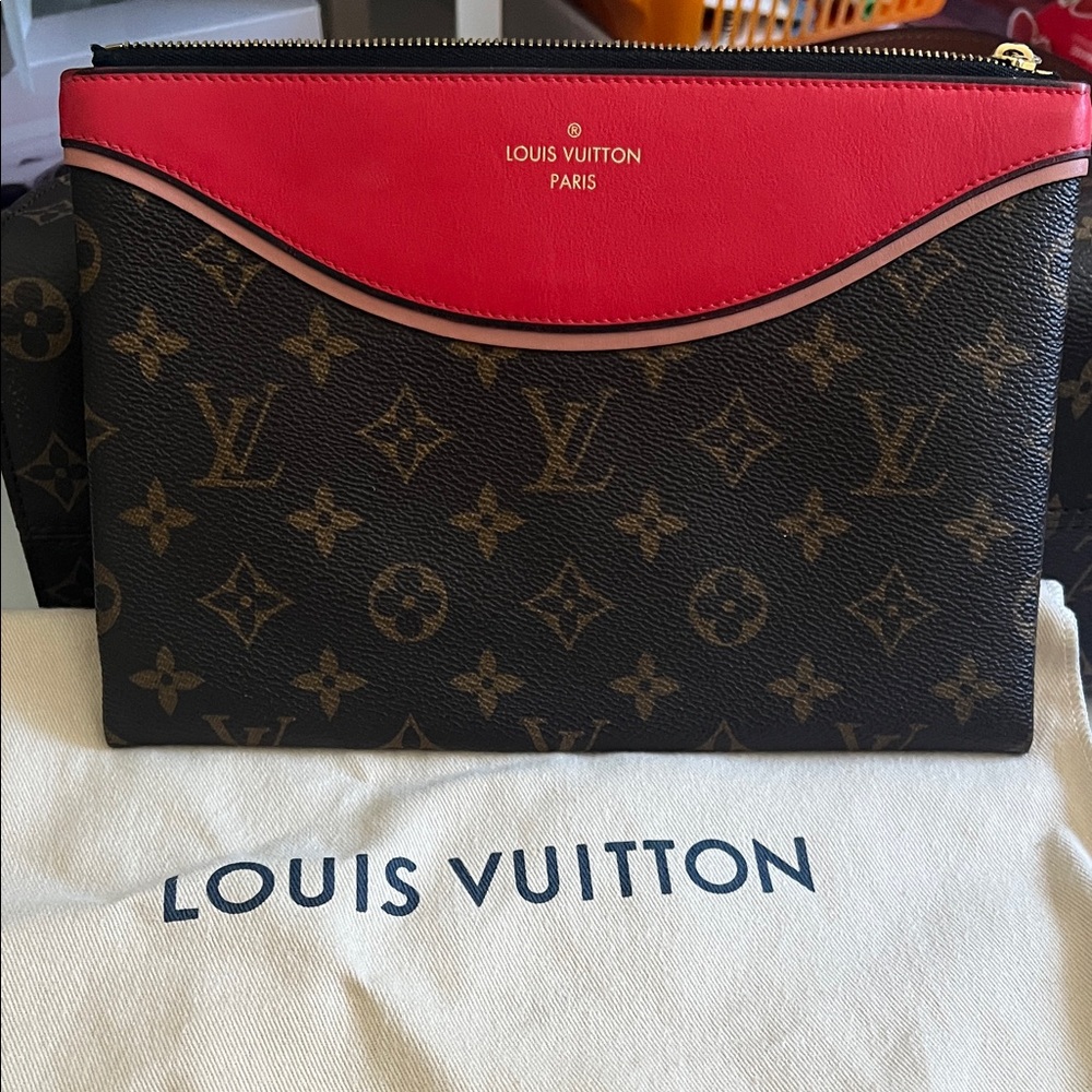 Authentic Louis Vuitton Tuileries DC Monogram Pouch with Bold Red Trim
